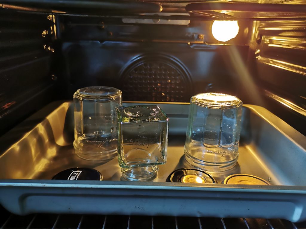 Tray of jars in oven